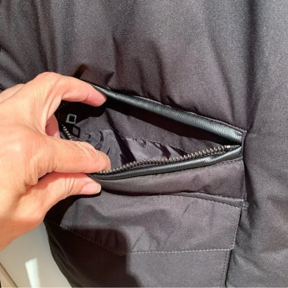 PRONTO UOMO. NWOT. Black jacket w/faux leather trim on shoulder. Three pockets.